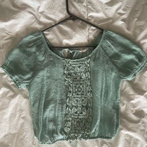 Green cropped shirt